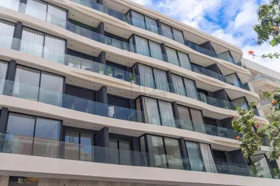 an apartment building with balconies on the side at Twenty Four Inn 306 in Casablanca