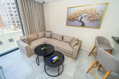 a living room with a couch and a table at Twenty Four Inn 305 in Casablanca