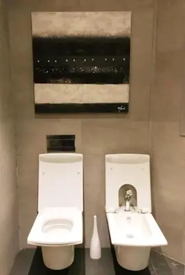 a bathroom with a toilet and a sink at Marina Ocean Suite - By Appart'Ayla in Casablanca