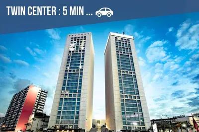 two tall buildings in a city with the words twin center at Appartement Spacieux a Maarif in Casablanca