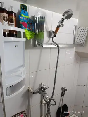 a shower in a kitchen with a white refrigerator at Alone Studio in Casablanca