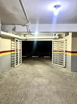 an empty room with white racks on the ceiling at Appartement en résidence privée in Casablanca
