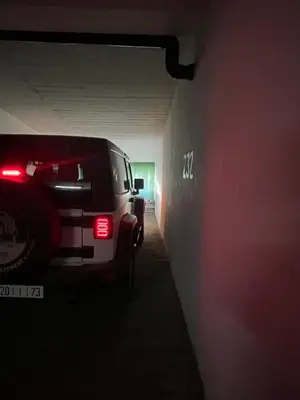 a white van parked in a dark tunnel at Magnifique appartement maarif in Casablanca