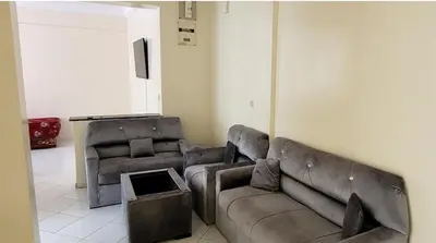 a living room with two couches and a couch at Residence Louma in Mohammedia