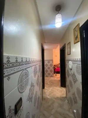 a hallway of a room with a hallway at Appartement Neo in Oulad Hamida