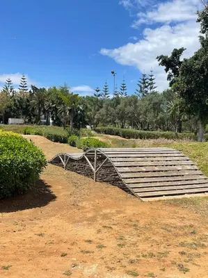 a large amphitheater sitting on top of a dirt field at Eden Island Bouznika Bel appartement avec jardin in Bouznika