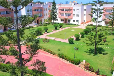 an aerial view of a park with trees and buildings at Mohammedia 2 in Mohammedia