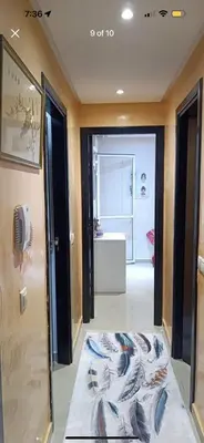 a bathroom with a bed in the middle of a room at الشقة دار بوعزة in Dar Bouazza