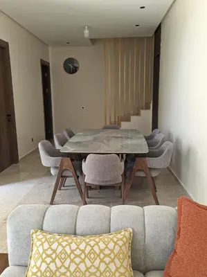 a dining room with a table and chairs at Villa Elia in Tamaris