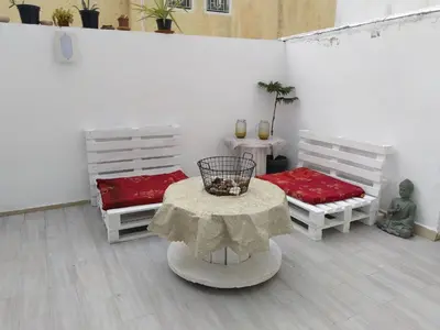 a room with two beds and a table with a table sidx sidx at Sweet Home in Casablanca