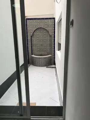 a view of a bathroom with a bath tub at Luxury apartment in Casablanca