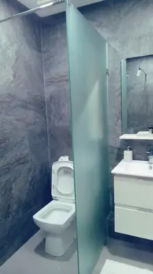 a bathroom with a toilet and a sink at Maarif dar zara 2 chambres ,Wifi ,Parking Gratuit in Casablanca