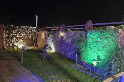 a display of a fence with grass and lights at Ferme Benslimane 30 min de rabat in O Ben Slimane