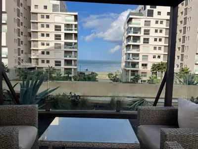 a view of the ocean from a balcony of a building at Charming Seaview Apartment 4 in Casablanca