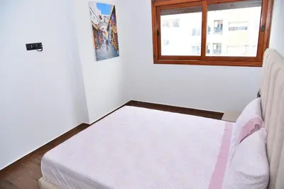 a room with a mattress and a window at Bel appartement au cœur de rabat in Rabat