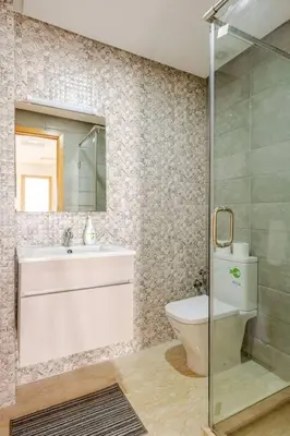 a bathroom with a toilet and a sink and a shower at Casa Gauthier - TT Holidays in Casablanca