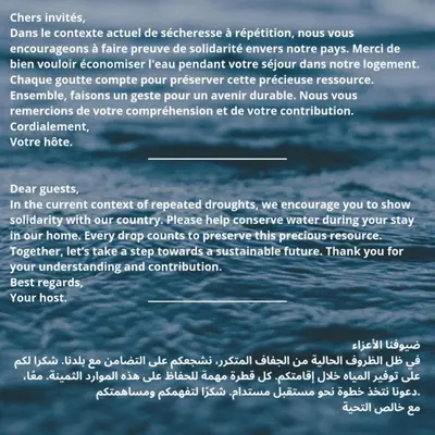 a page of a poem with the ocean in the background at Studio l'Escale D'Agdal in Rabat