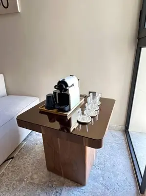 a coffee table with glasses and a toaster on it at Studio Monaco in Casablanca