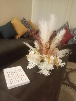 a table with a remote control on top of it at Downtown Stay 1Br near Tramway - Parking in Casablanca