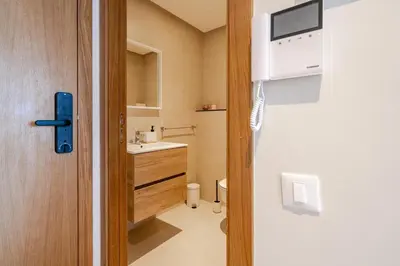 a small bathroom with a toilet and a sink at Emplacement Chic Lumineux & Central Près du Consulat Américain 2 minutes de Twin Center Gauthier Casablanca in Casablanca