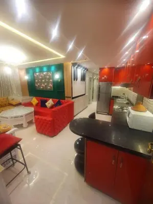 a room with a kitchen and a living room at Grand et magnifique appartement in Casablanca