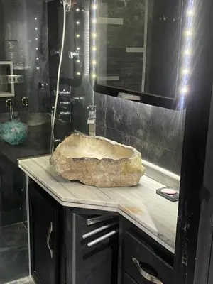 a stone sink on a counter in a bathroom at Casablanca Bourgogne in Casablanca