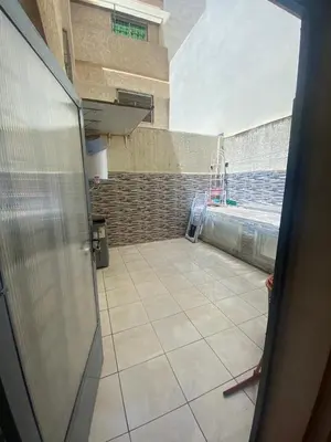 a room with a room with a tile floor at Duplex in Casablanca