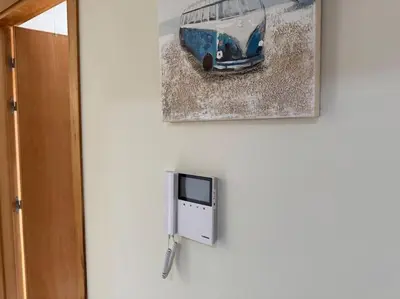 a picture of a bus hanging on a wall at Luxueux Appartement avec Piscine et Terrasse in Bouznika