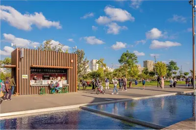 a group of people walking in a park with a building at Downtown Luxury Stay CIL in Casablanca