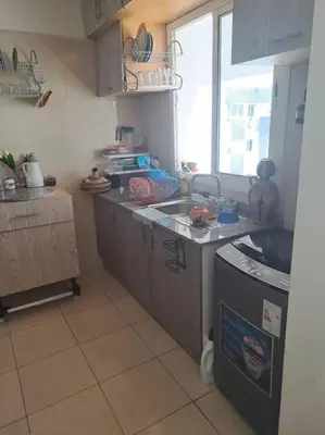 a kitchen with a sink and a counter top at Moonskhirat in Skhirat