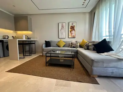 a living room with a couch and a table at Studio Anfa Living 1 in Casablanca