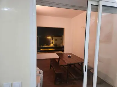 a dining room with a table and a window at Apartment Ocean View 2Br in Casablanca
