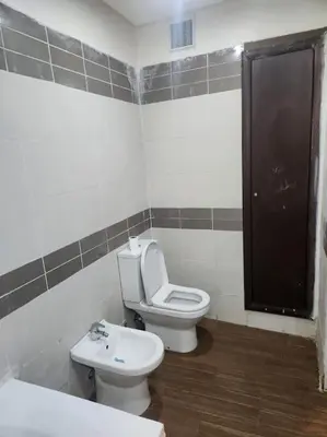a bathroom with a toilet and a sink at Apartment Ocean View 2Br in Casablanca