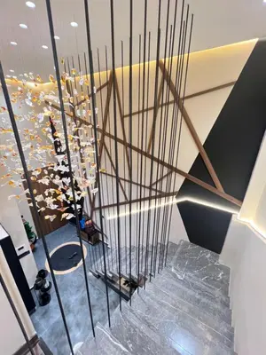 a staircase in a building with a spiral stair case at Quart des hôpitaux duplex luxe et sérénité in Casablanca
