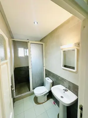 a bathroom with a toilet and a sink at ONOMSUIT-Appartement en plein centre ville RABAT in Rabat