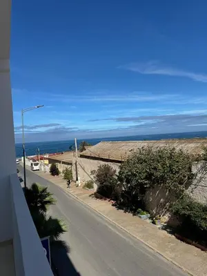 an empty street with a view of the ocean at Ksar Labhar City Escape in Rabat