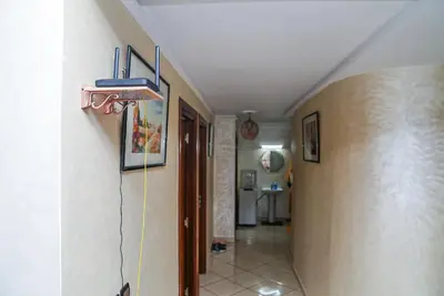 a hallway with a basketball hoop on the wall at Peaceful Apartment with AC & fiber-speed internet in Casablanca
