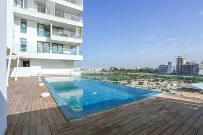 a swimming pool on the deck of a building at Résidence Luxuria - Rooftop Pool in Casablanca