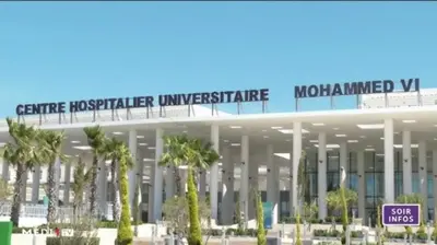 a large building with palm trees in front of it at appartement neuf top quartier bouskoura a 2 min de l'Hôpital Universitaire International Mohammed 6 in Casablanca