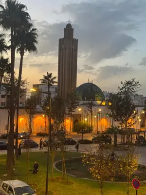 a city with a large building with a clock tower at Appartement de luxe 155m agdal centre in Rabat