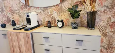 a dresser with a hair dryer on top of it at One-Five Racine by IB Signature, Stylish 2BR Apt, 24x7 Security, WiFi, Self check-in, City View, City Centre, close to cafes and restaurants in Casablanca