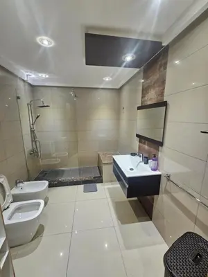 a bathroom with a toilet and a sink and a shower at Studio spacieux plein centre in Casablanca