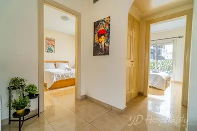 a room with a bedroom with a bed and a mirror at Gauthier 5-Star Luxury Gem in Casablanca