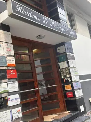 a sign over the door of a pharmacy at Studio au cœur du centre ville de Casablanca in Casablanca