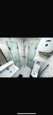 a bathroom with a toilet and a sink and a mirror at Ma Raffiné Ziraoui in Casablanca