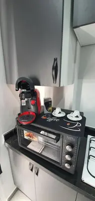 a kitchen with a toaster oven on a counter at Cozy Apartement B-House Airport in Berrechid
