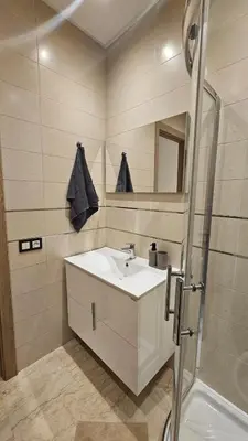 a bathroom with a sink and a shower at Apartment with terrace - Strategic location in Casablanca
