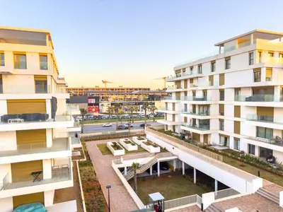 an apartment building with a view of a street at le carrousel Residence Rabat in Rabat