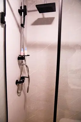 a shower in a bathroom with a glass door at R103- Comfy and Spatious 1 BR Apartment with Breathtaking City View - Belvédère in Casablanca