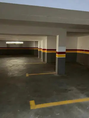 an empty parking lot in an empty parking garage at Luxury 2 bedroom flat in Tamaris Dar Bouazza in Casablanca